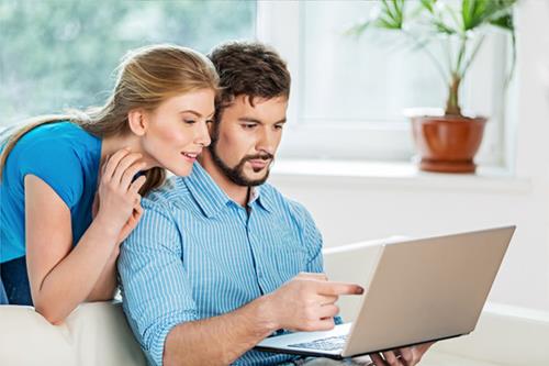 couple-laptop-106.jpg - Real Estate News