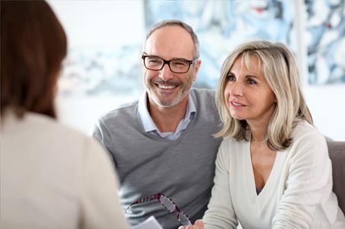 Senior Couple Meeting Agent